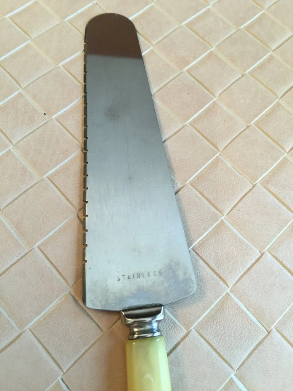 Stainless Steel Cheese Knife with Cream Colored Handle 9 1/2